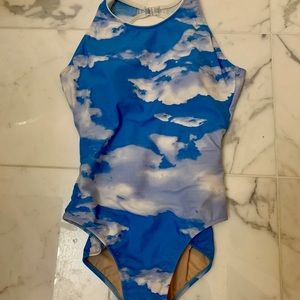 Clouds on blue background bathing suit